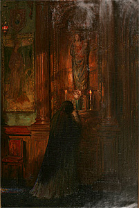 woman praying before altar
