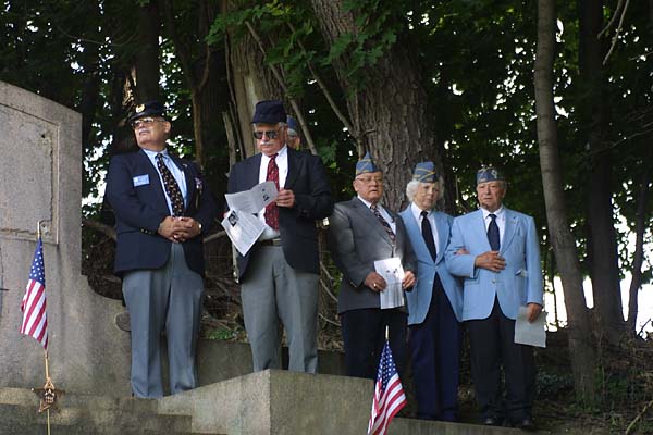 Group to right of stone
